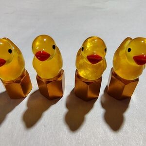 Set of Four Yellow Duck Figurines